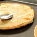 بالصور وصفة بيتزا بالطماطم والجبن الريكوتا