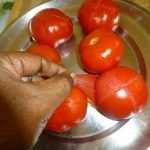 عمل مربي الطماطم بالصور