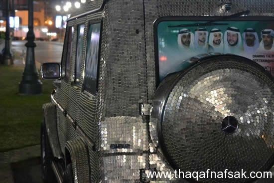 شركة مخصوصة في تغطية سيارات بآلاف العملات المعدنية اللامعة شركة مخصوصة في تغطية سيارات بآلاف العملات المعدنية اللامعة