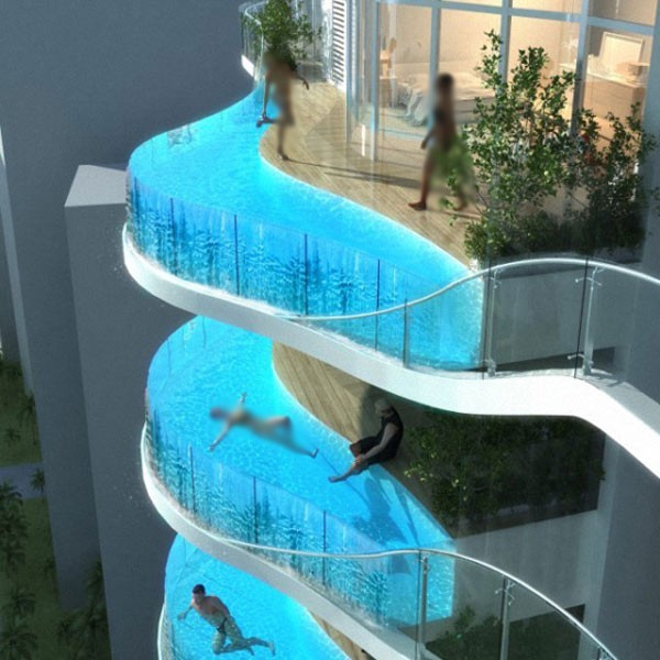 تصميم برج سكنى مدهش مزين بأحواض سباحة زجاجية تصميم برج سكنى مدهش مزين بأحواض سباحة زجاجية